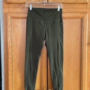 Danskin Dark Olive Leggings size medium 
Side pockets